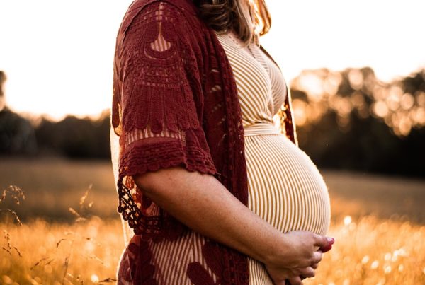 pregnant woman in field